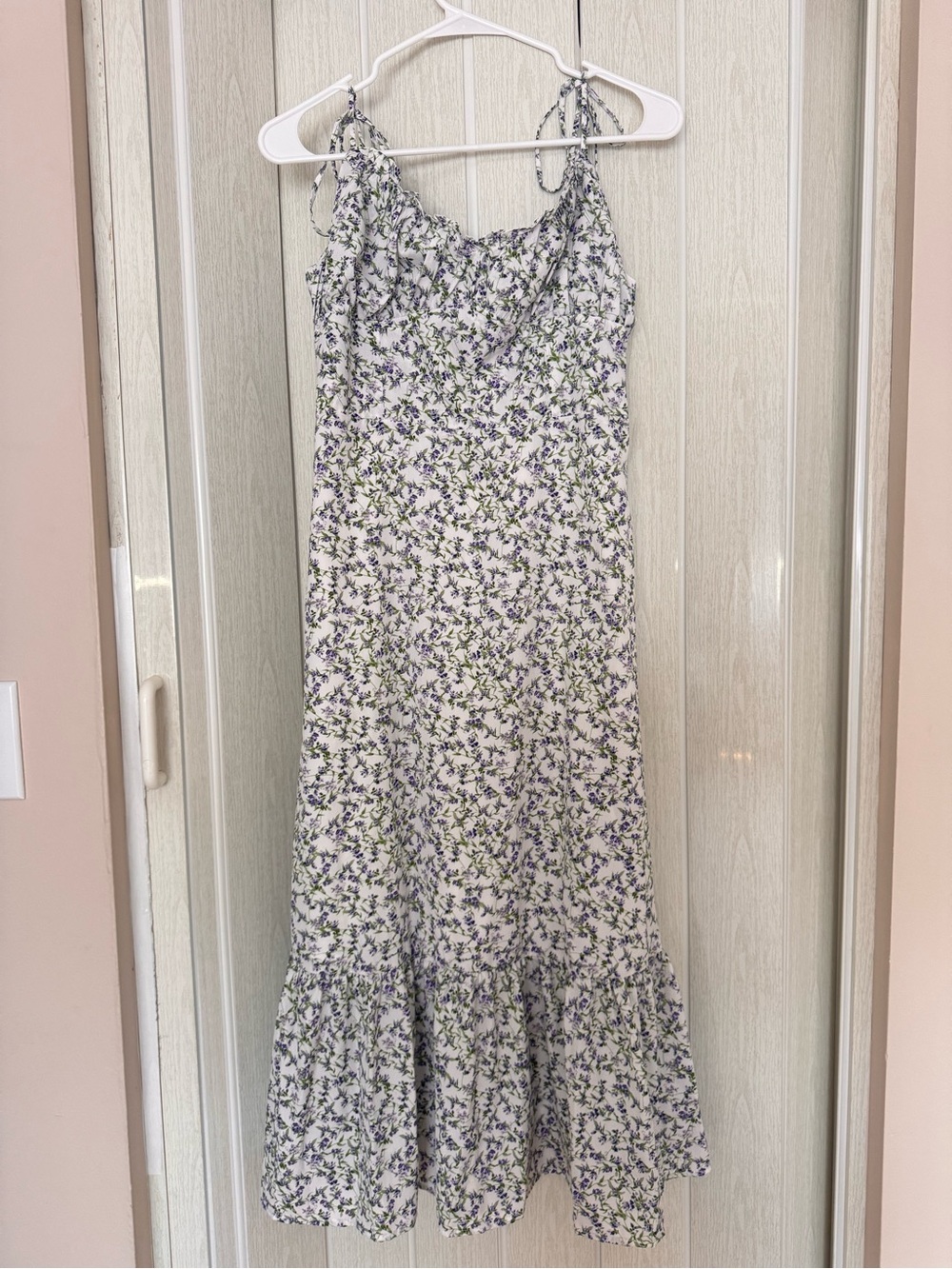 Aqua blue floral midi dress with adjustable straps and ruffle hem